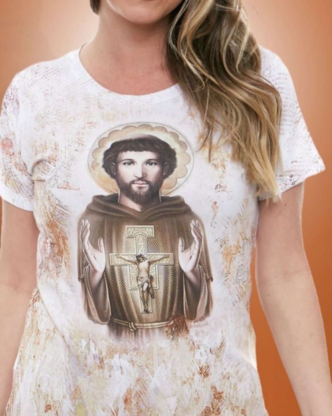 Expresse sua devoção com a camisa de São Francisco de Assis, perfeita para mulheres. Conforto e estilo em uma peça que celebra a fé e a natureza. Compre a sua hoje!